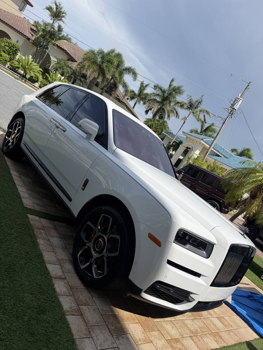 Detailed Rolls-Royce Cullinan, white paint
