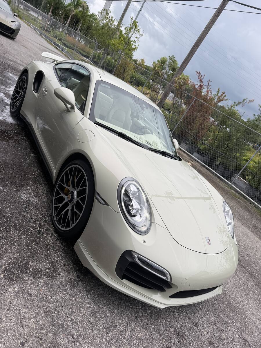 Detailed Porsche 911 Turbo, pearl white paint